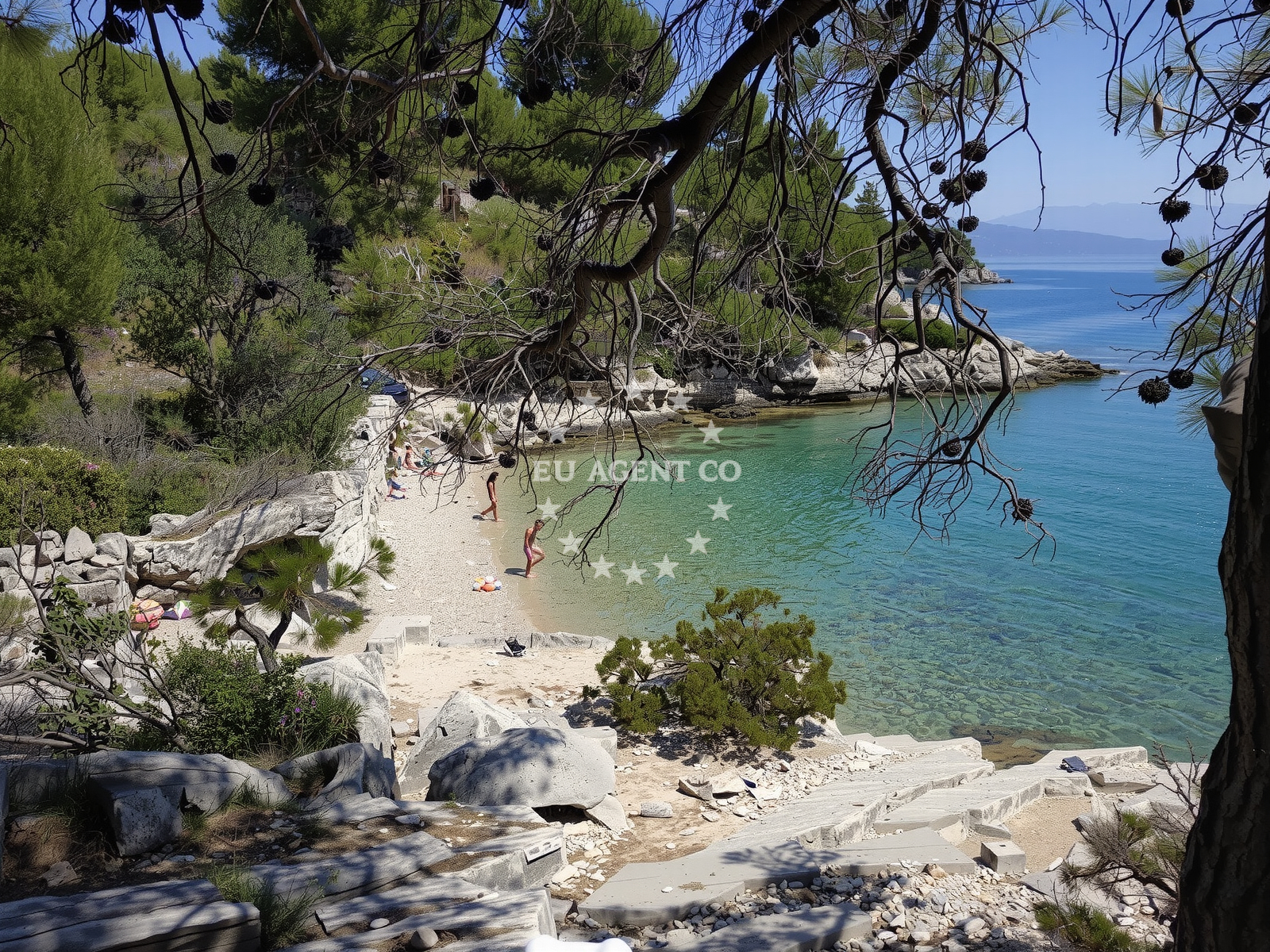 Shoreline and swimming area at Maslinica beach in , Vrboska