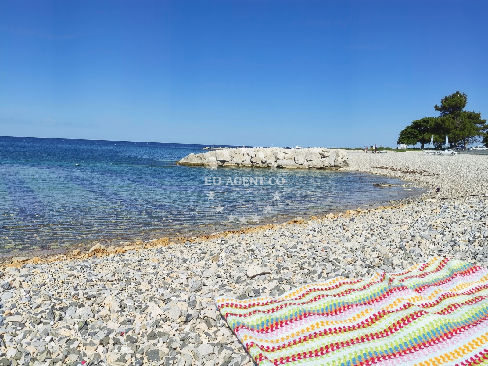 Shoreline and swimming area at Materada beach in Materada 31, Poreč