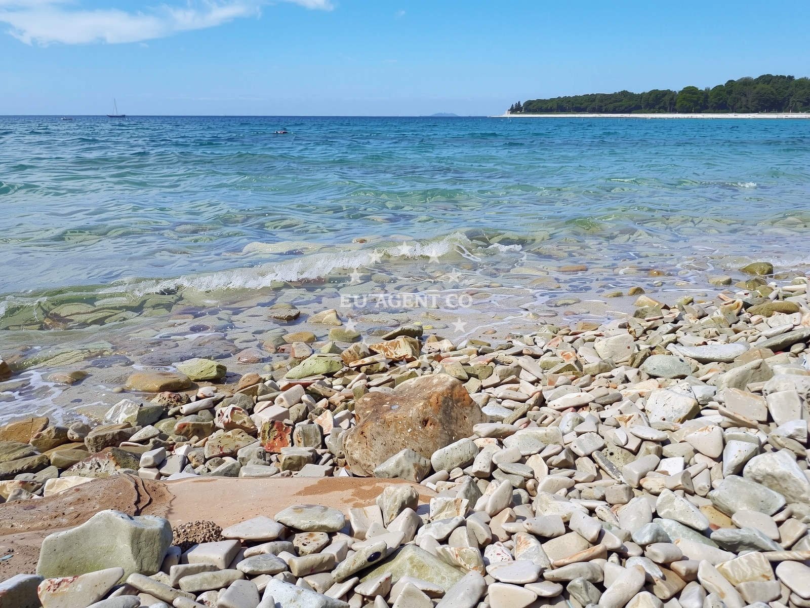 Beach facilities and surroundings at Meneghetti beach in Barbariga 9, Barbariga