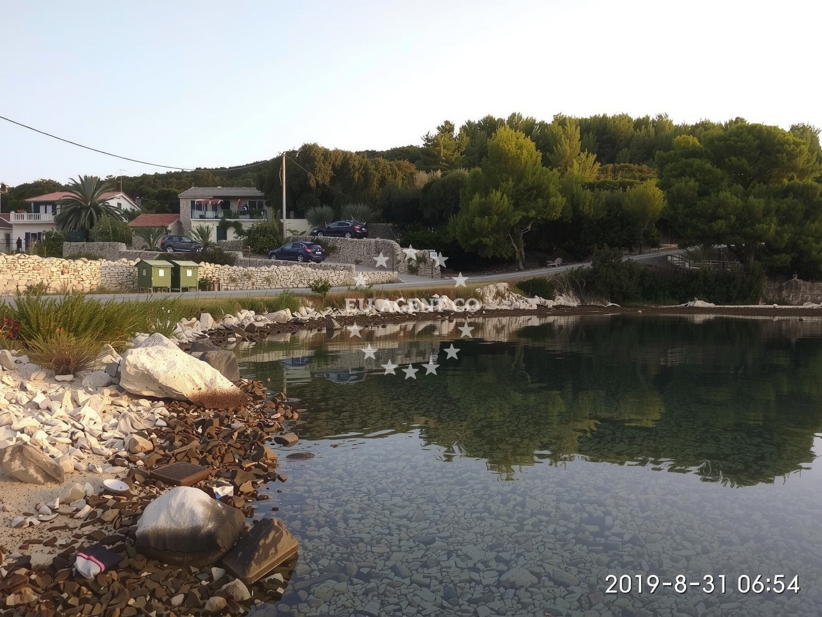 Shoreline and swimming area at Mumanovic beach in UVALA PARJA 9, Rogačić