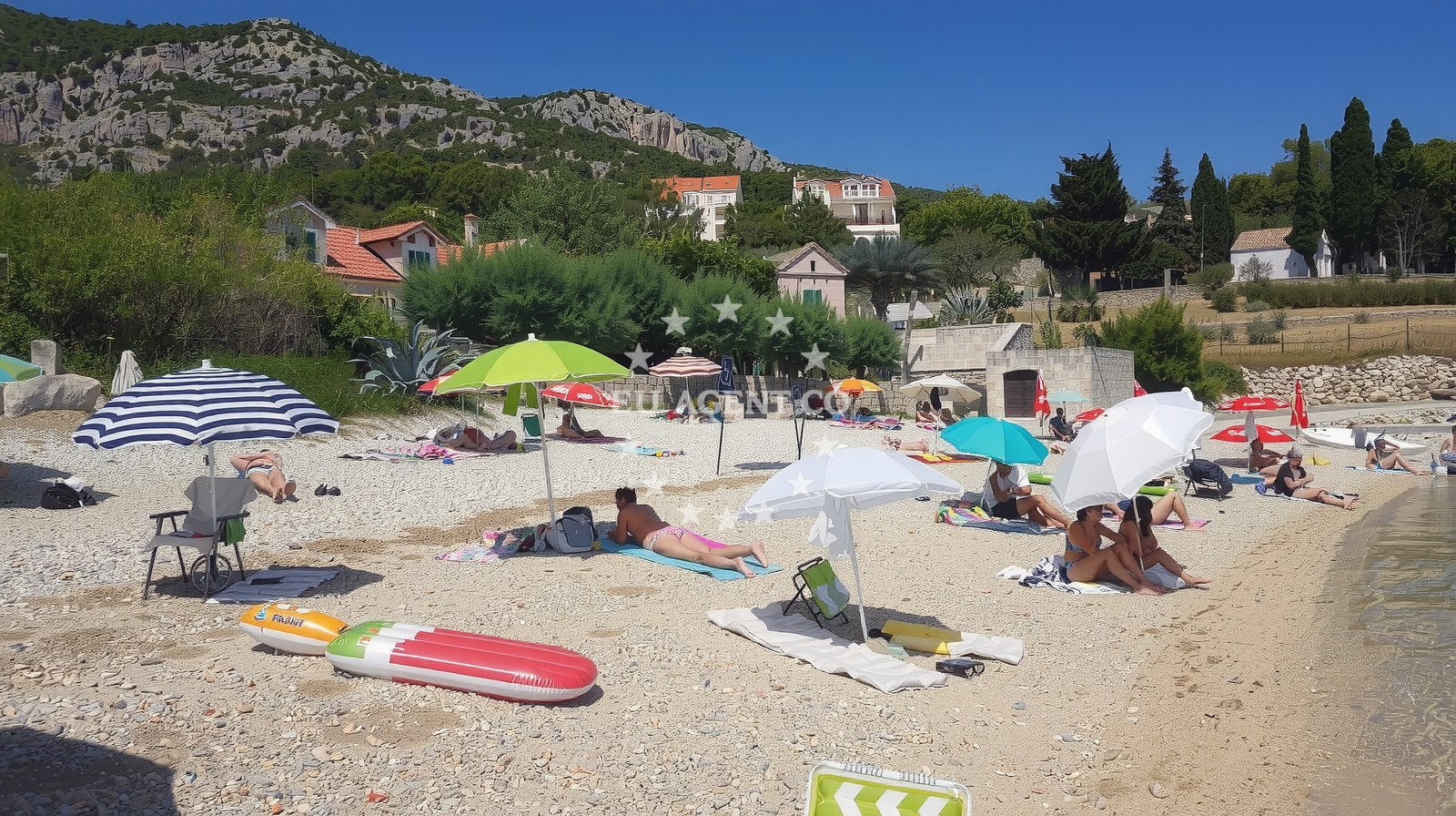 Beach facilities and surroundings at Notos Hvar beach in Milna 3rd floor, Milna