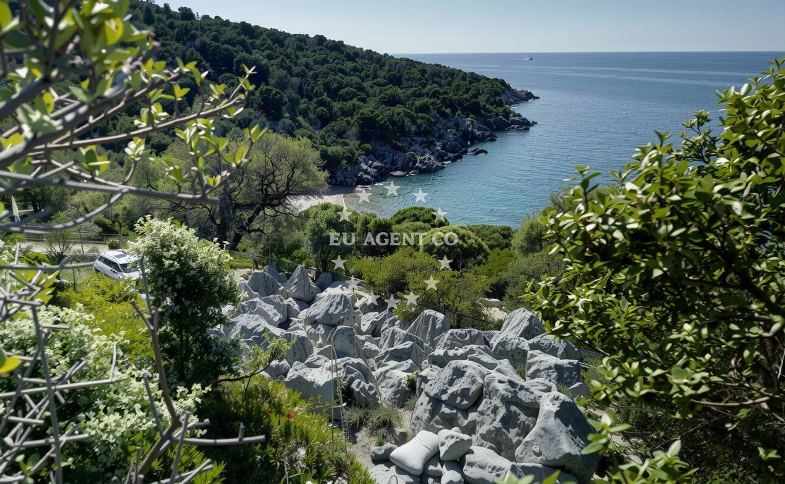 Shoreline and swimming area at Olive Gardens beach in Lun 102, Lun