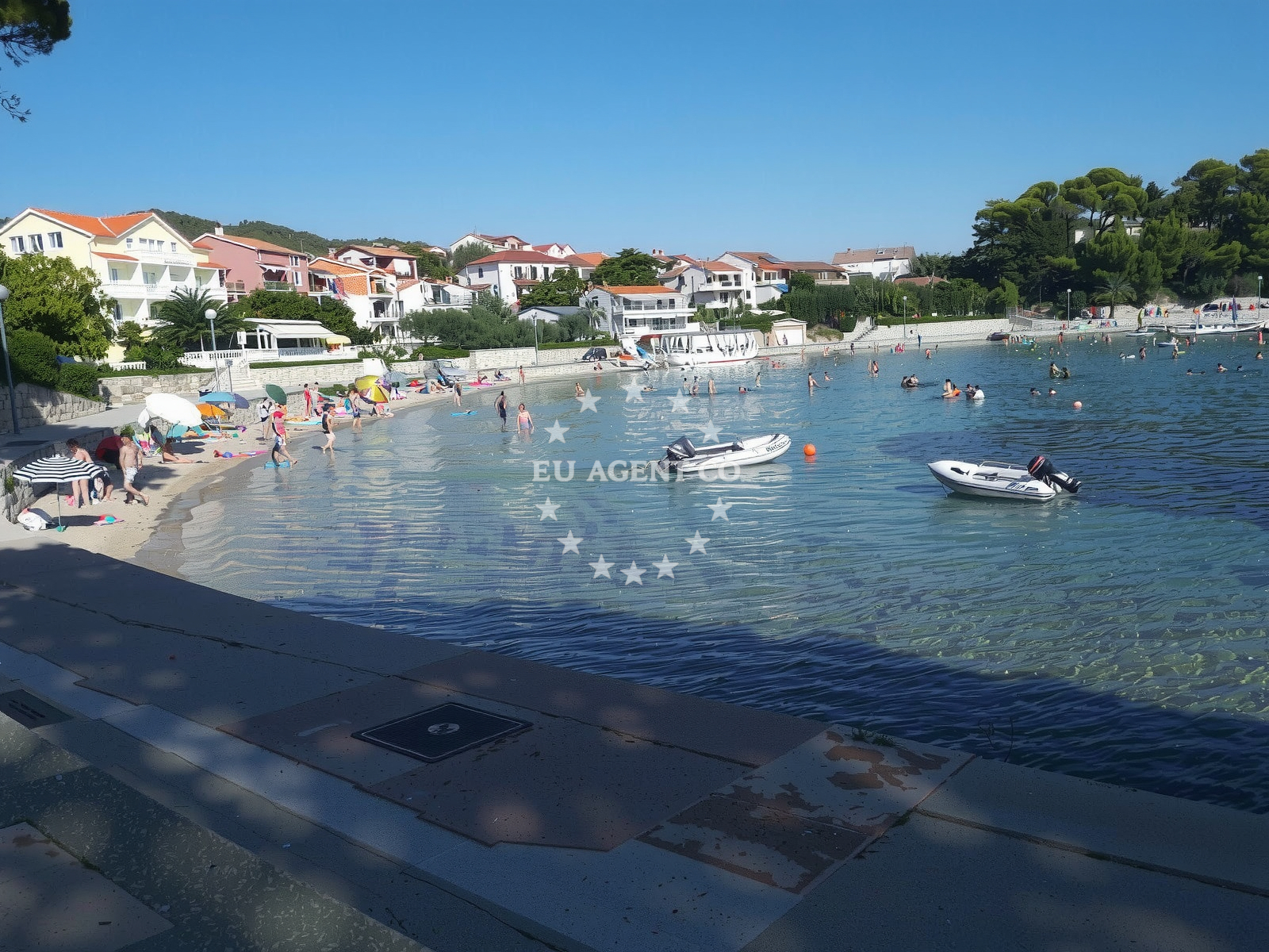 Shoreline and swimming area at Padova II beach in Banjol 335, Banjol