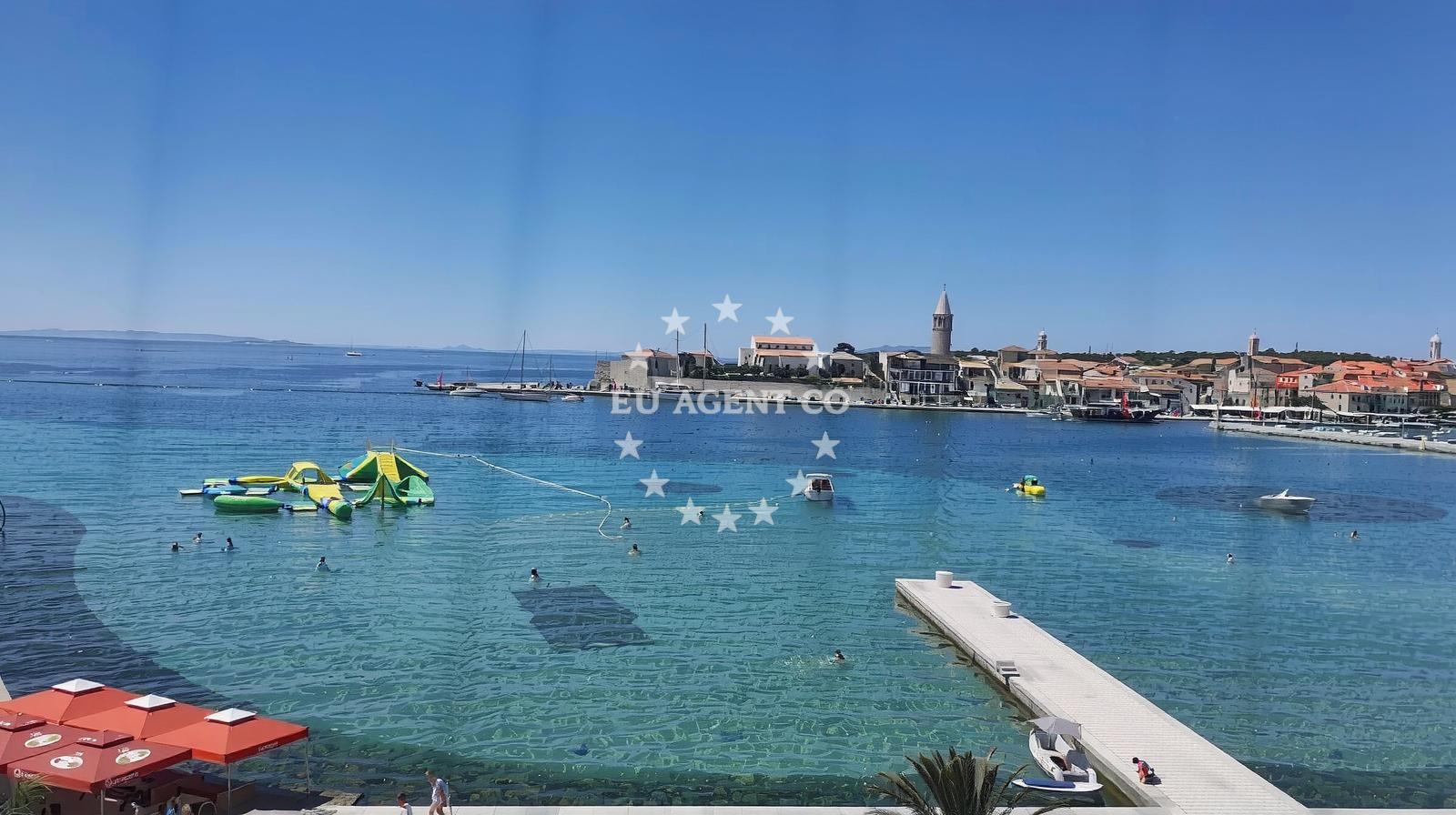 Shoreline and swimming area at Padova III beach in Banjol, Rab