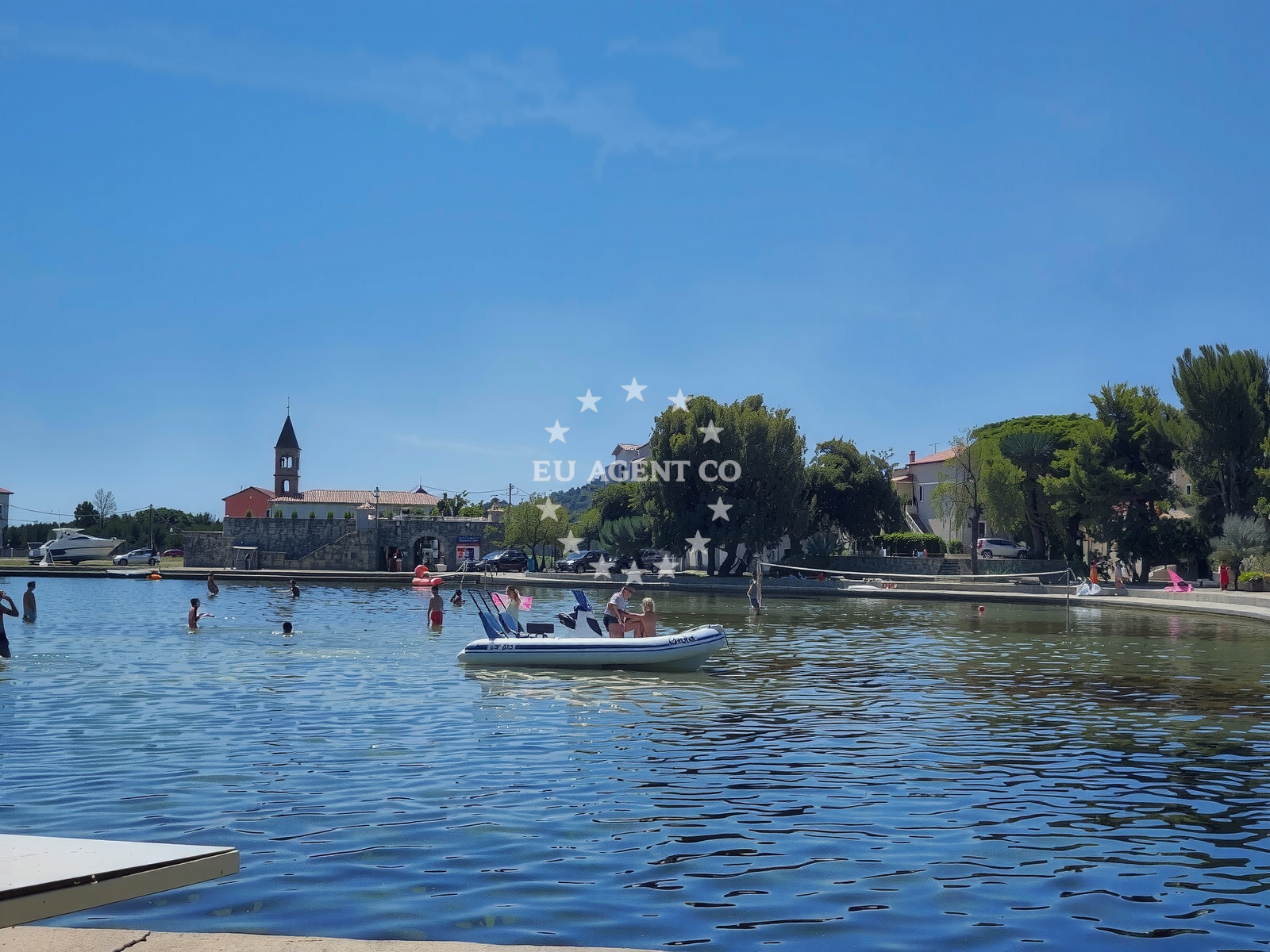 Shoreline and swimming area at Plaza Duzica in , Tkon