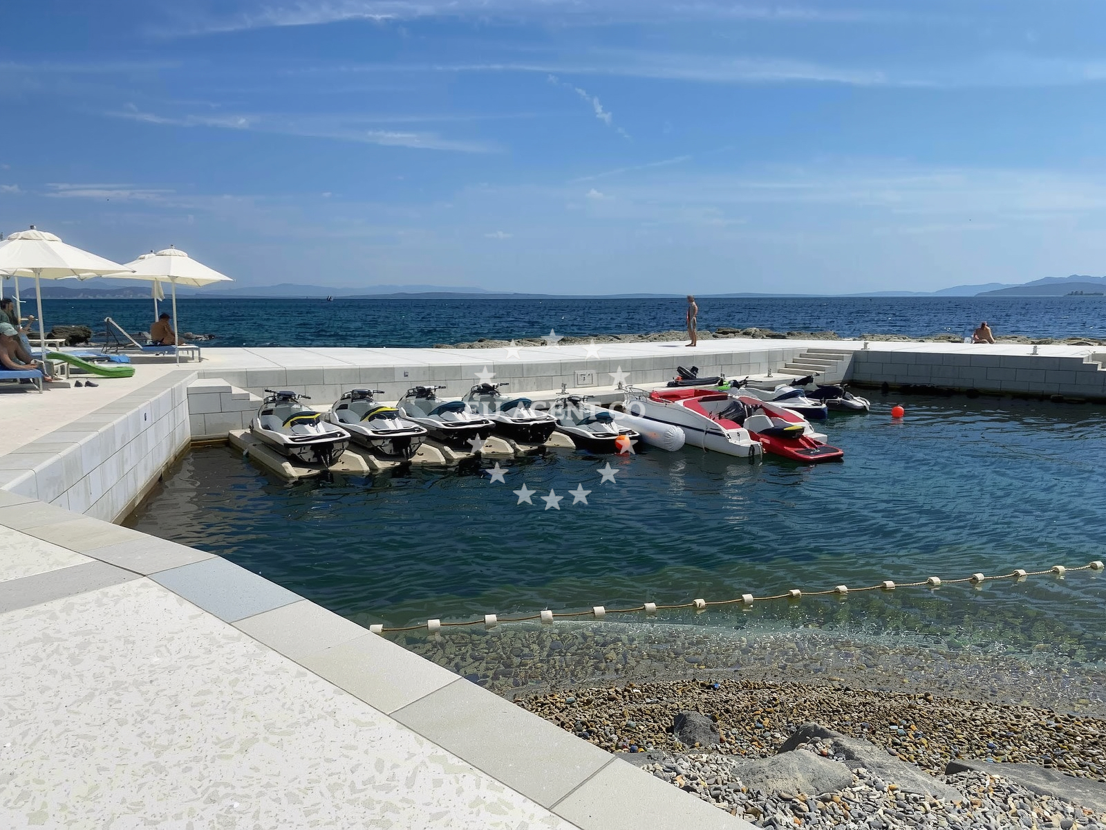 Shoreline and swimming area at Plaza Hotel Hilton