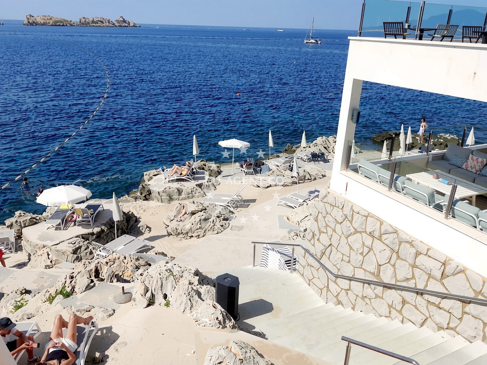 Shoreline and swimming area at Plaza Neptun