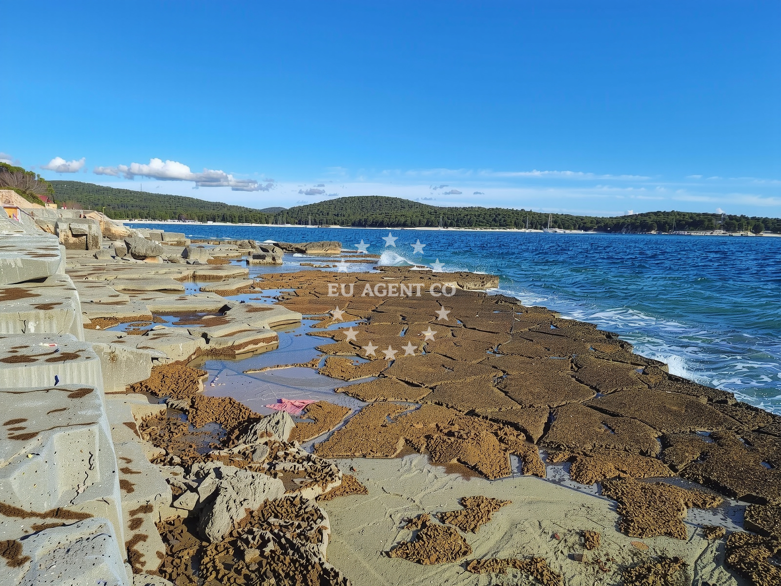 Shoreline and swimming area at Plaza Palud in San Pol 1, Bale