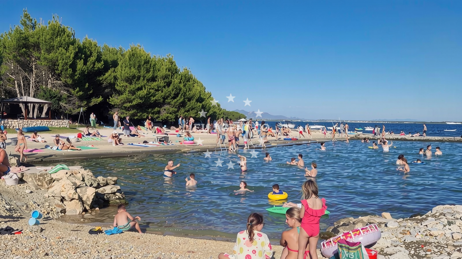 Shoreline and swimming area at Plaza Pedinka in Pedinka VII, br.19, Vir