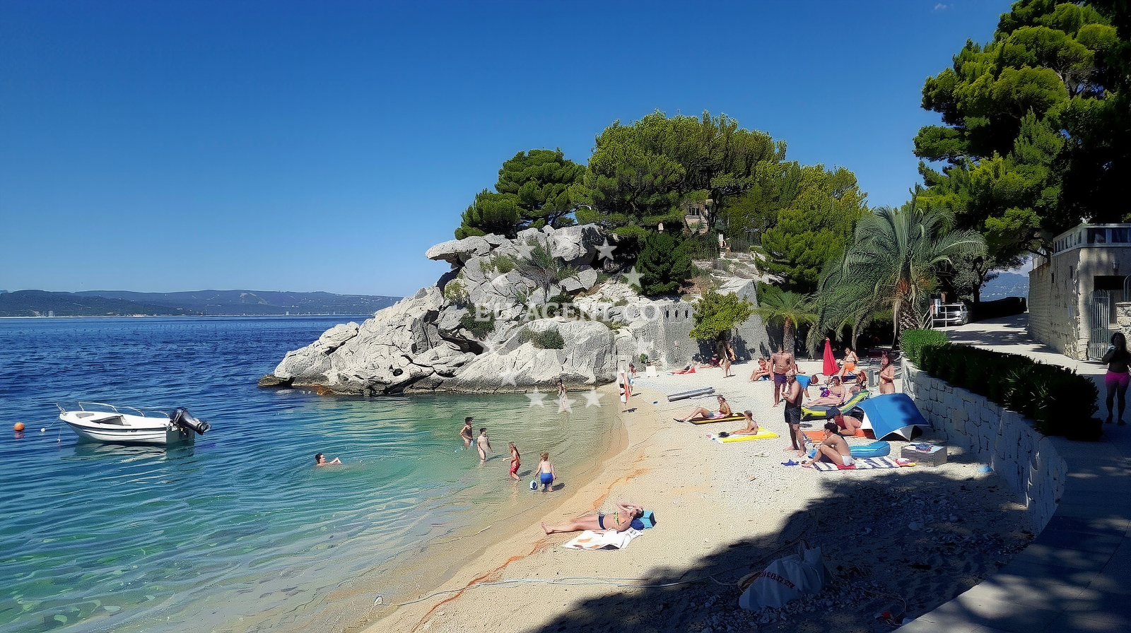 Shoreline and swimming area at Plaza Podrace in Breljanska cesta 34, Brela