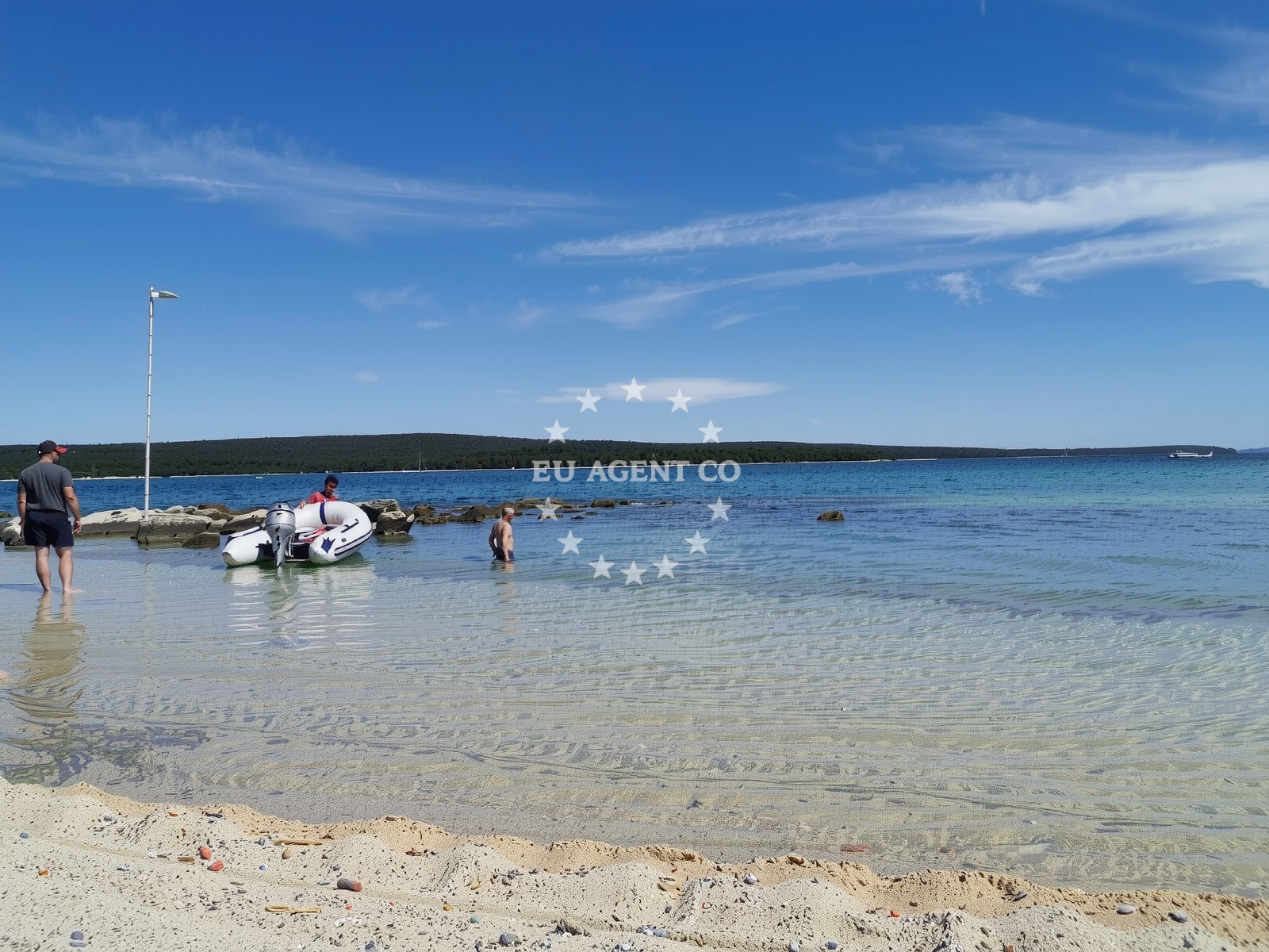 Shoreline and swimming area at Plaza Ridimutak in 73 Ulica Vladimira Gortana, Nerezine