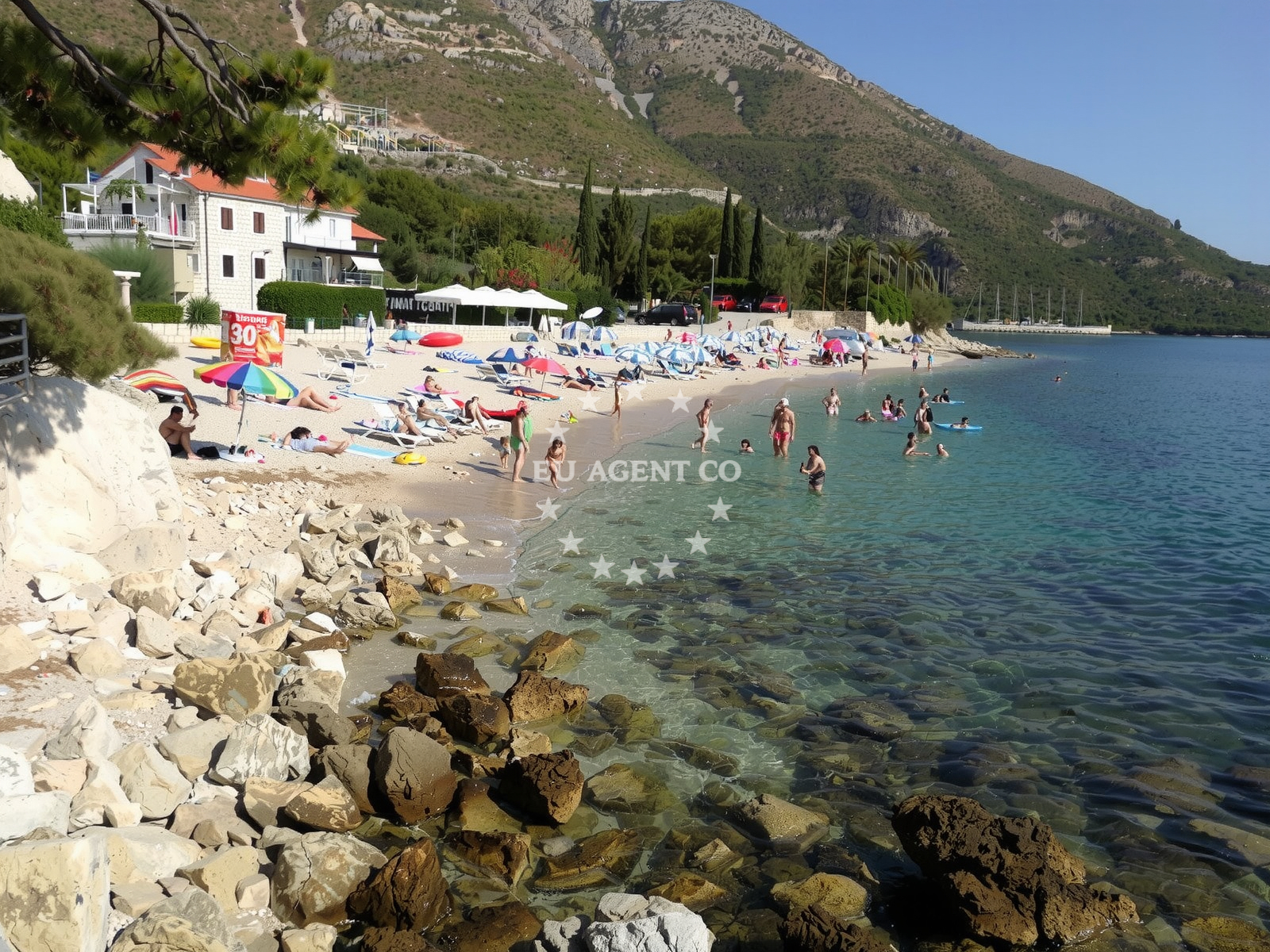 Shoreline and swimming area at Pod Maslovo beach in Plat 18, Mlini