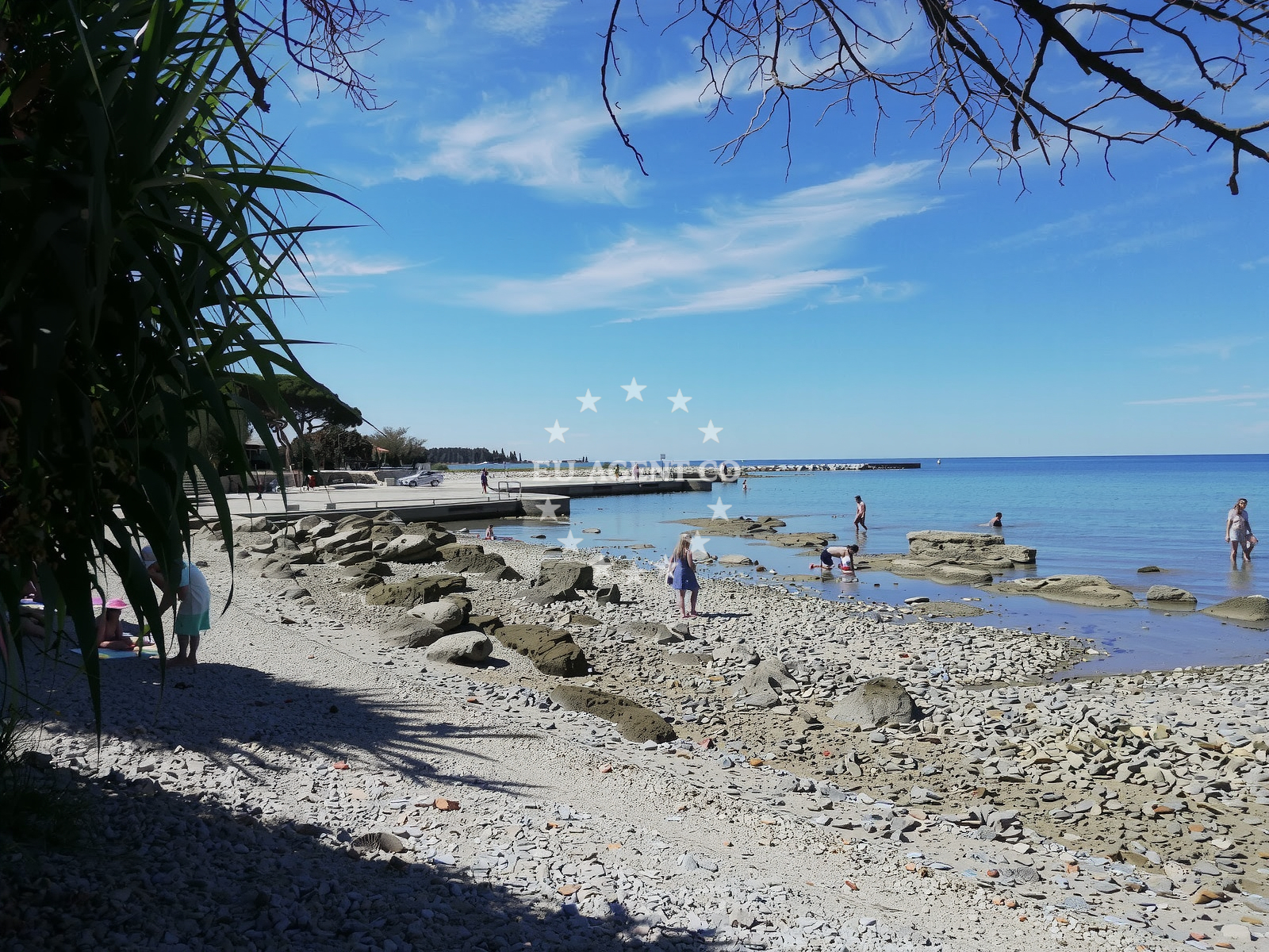 Shoreline and swimming area at Polynesia beach in Umaska 2/A, Umag