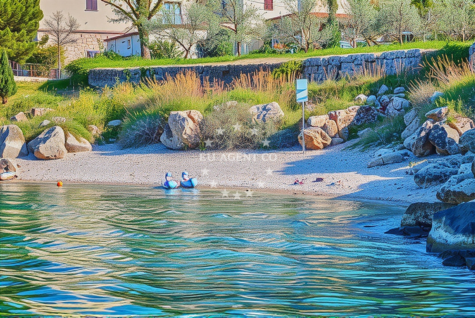 Shoreline and swimming area at Porat beach in Porat 185, Porat