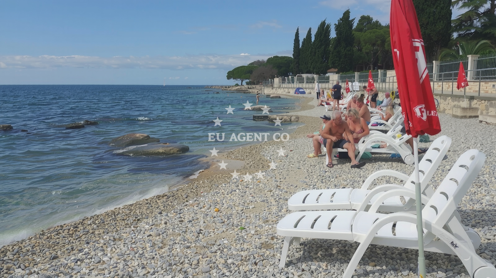 Shoreline and swimming area at Porec beach in 38 Špadići, Poreč