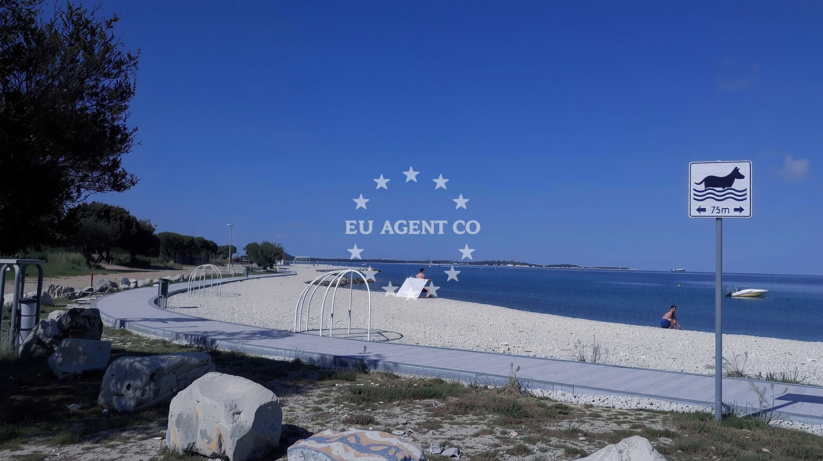 Beach facilities and surroundings at Portic beach in , Peroj