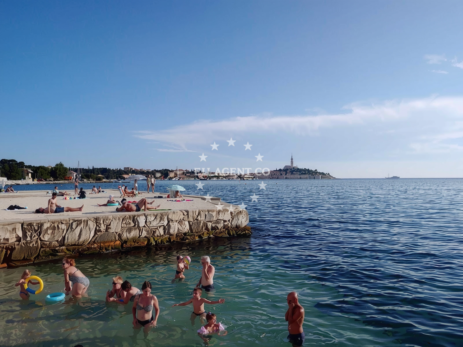 Shoreline and swimming area at Porton Biondi beach in Tonija Godene 8, Rovinj