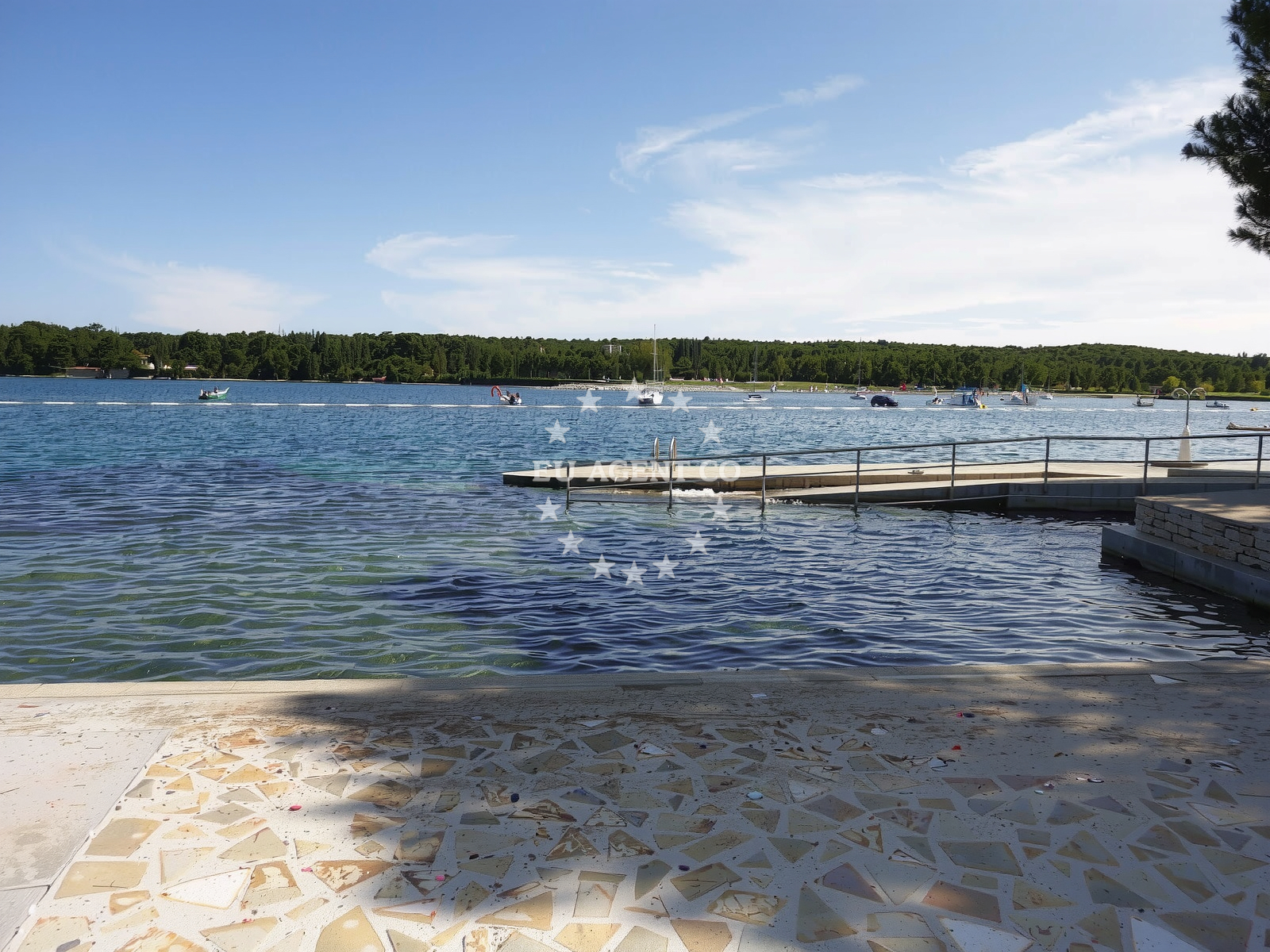 Shoreline and swimming area at Puntica beach in Grgeti 1A, Funtana