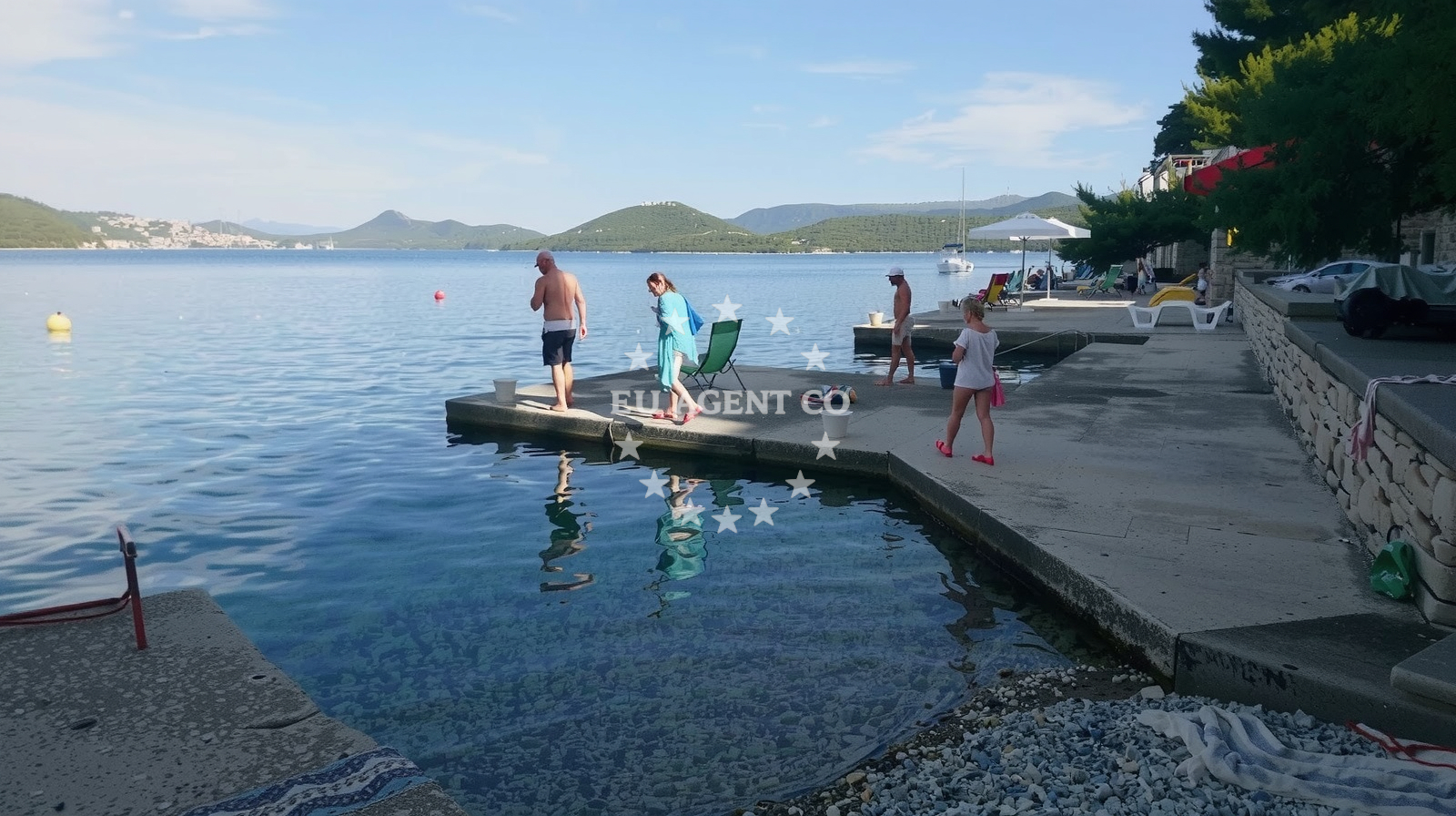 Shoreline and swimming area at Radalj beach in Radalj, Klek