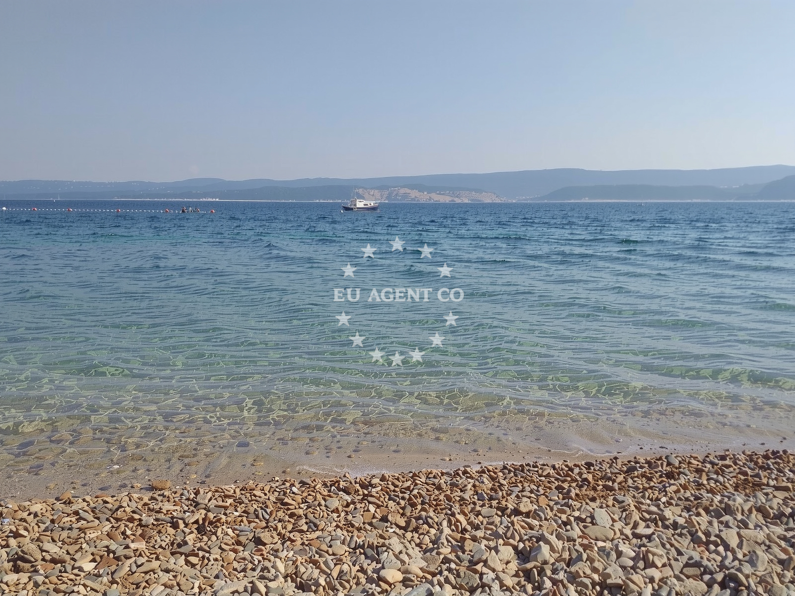 Shoreline and swimming area at Ruskamen beach in 21 Ruskamen II, Lokva Rogoznica
