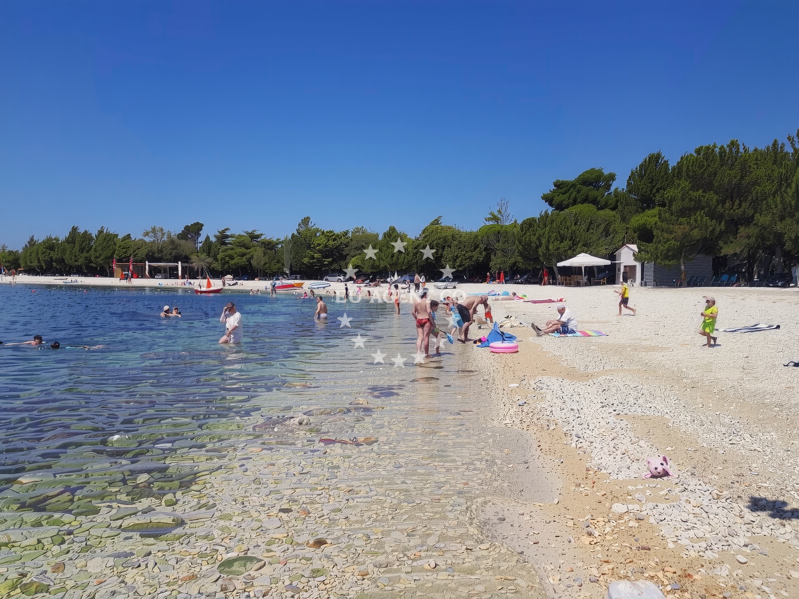 Shoreline and swimming area at Simuni III beach in 108a Šimuni, Šimuni