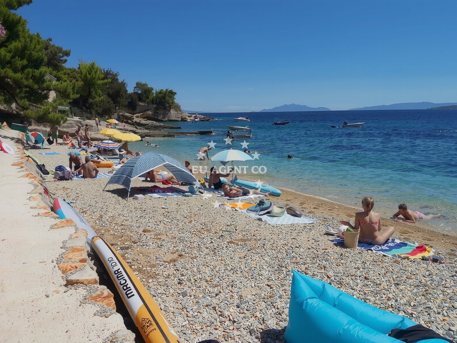 Shoreline and swimming area at Skalinada beach in , Jelsa