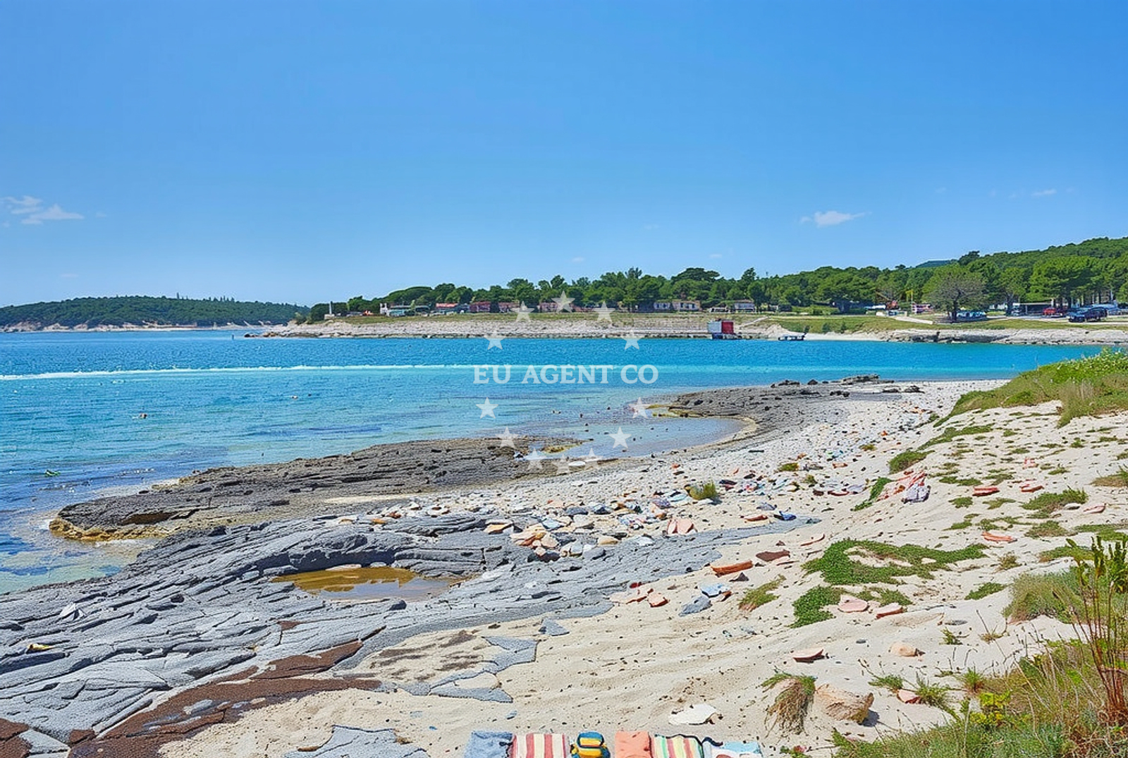 Shoreline and swimming area at Školjić Stupice, Premantura Beach in Školjić Stupice
