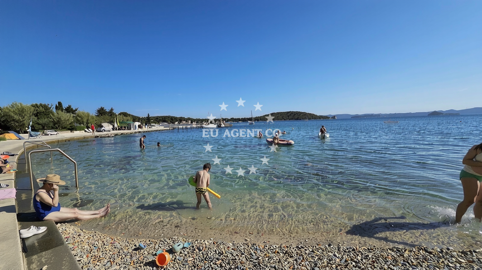 Shoreline and swimming area at Skraca Beach in Ribarska obala 11, Muline, Ugljan