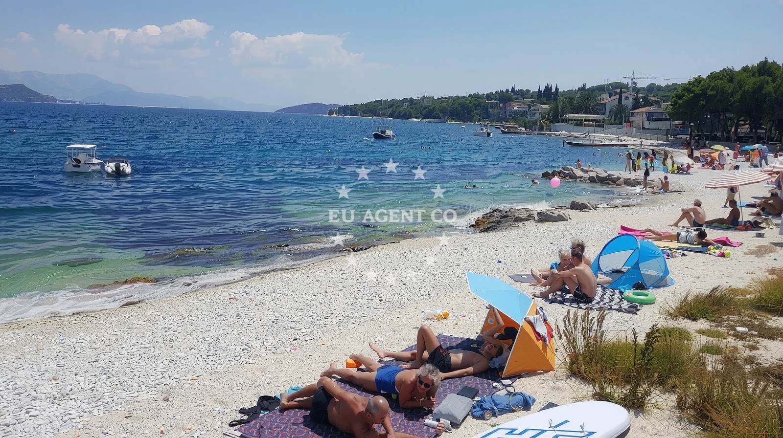 Shoreline and swimming area at Slatine II beach in 21 Trogirska, Slatine
