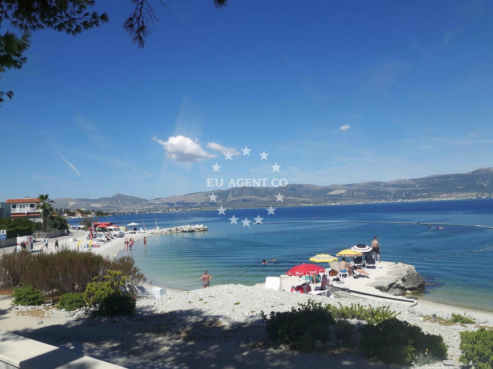 Shoreline and swimming area at Slatine IV beach in , Slatine