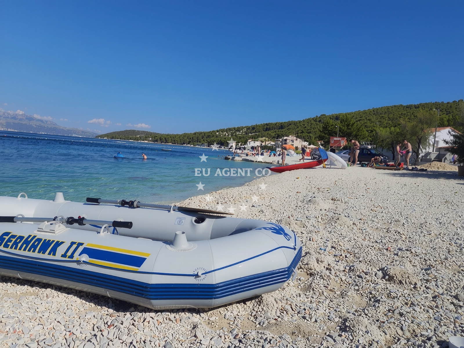 Beach facilities and surroundings at Slatine IV beach in , Slatine