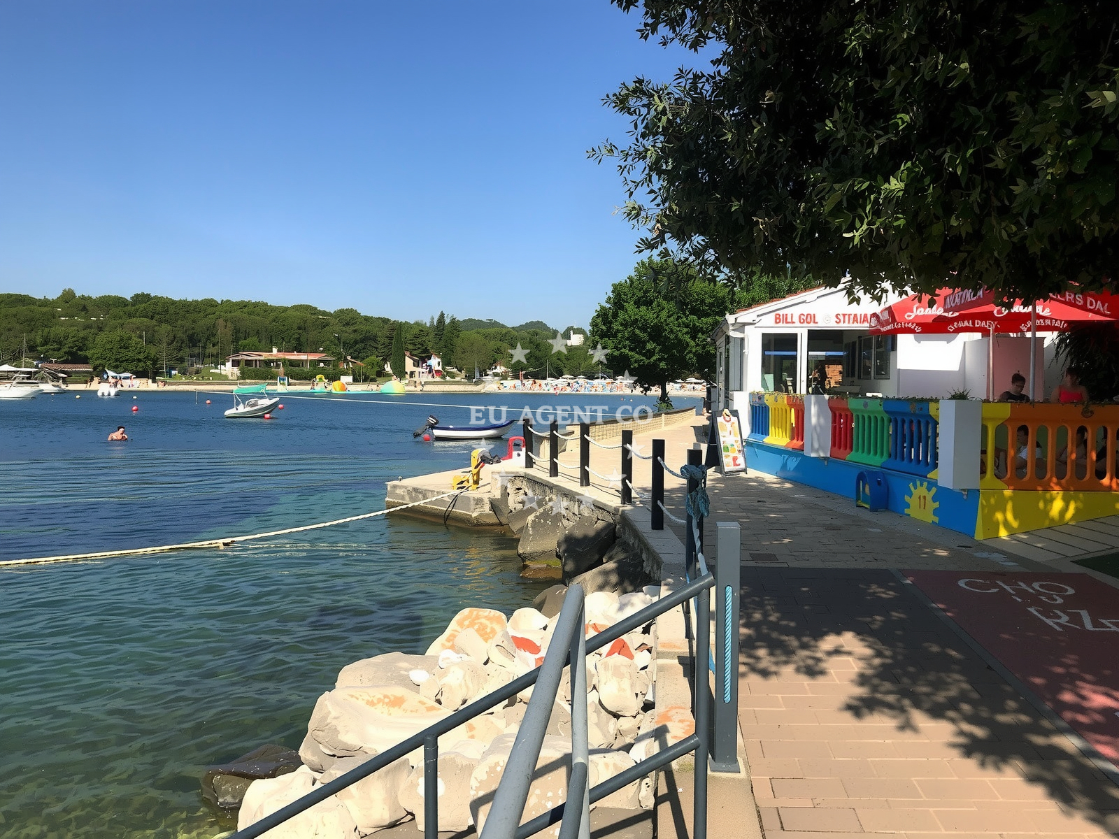 Beach facilities and surroundings at Tar beach in Lanterna 15, Poreč