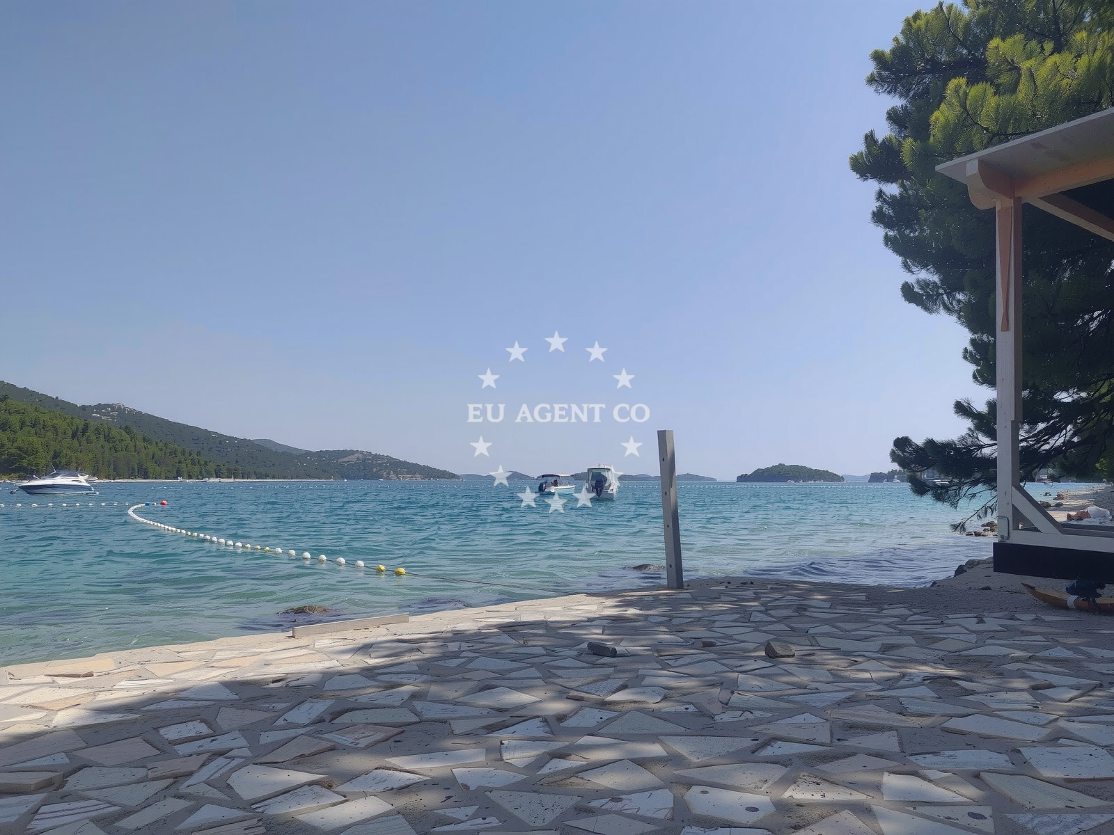 Beach facilities and surroundings at The Garden Tisno beach in Pod Garmom 51, Tisno