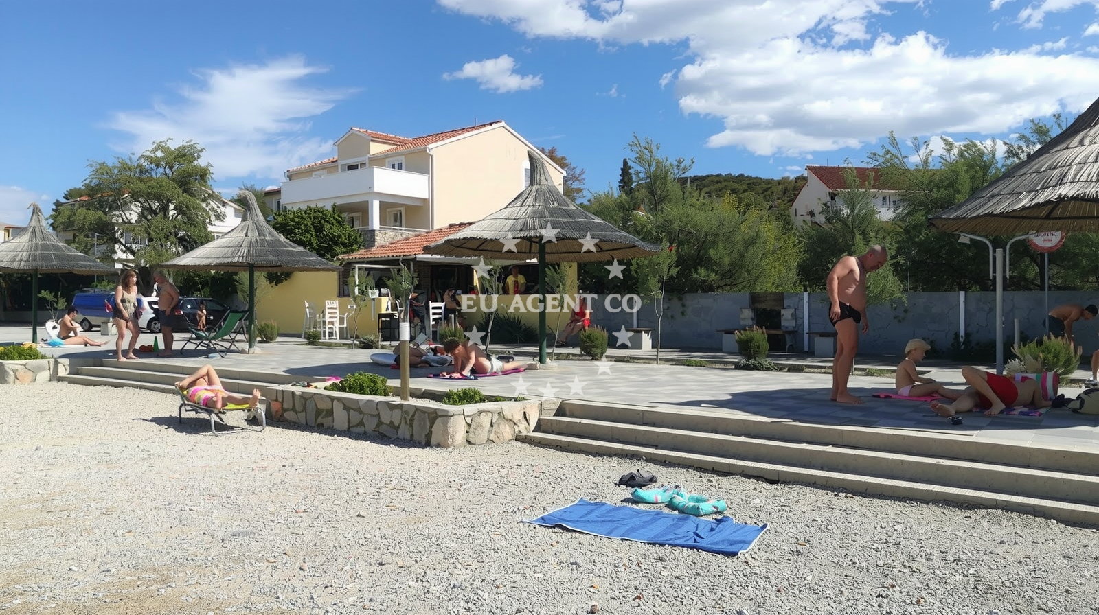 Shoreline and swimming area at Tkon beach in Ispod Volta 16, Tkon