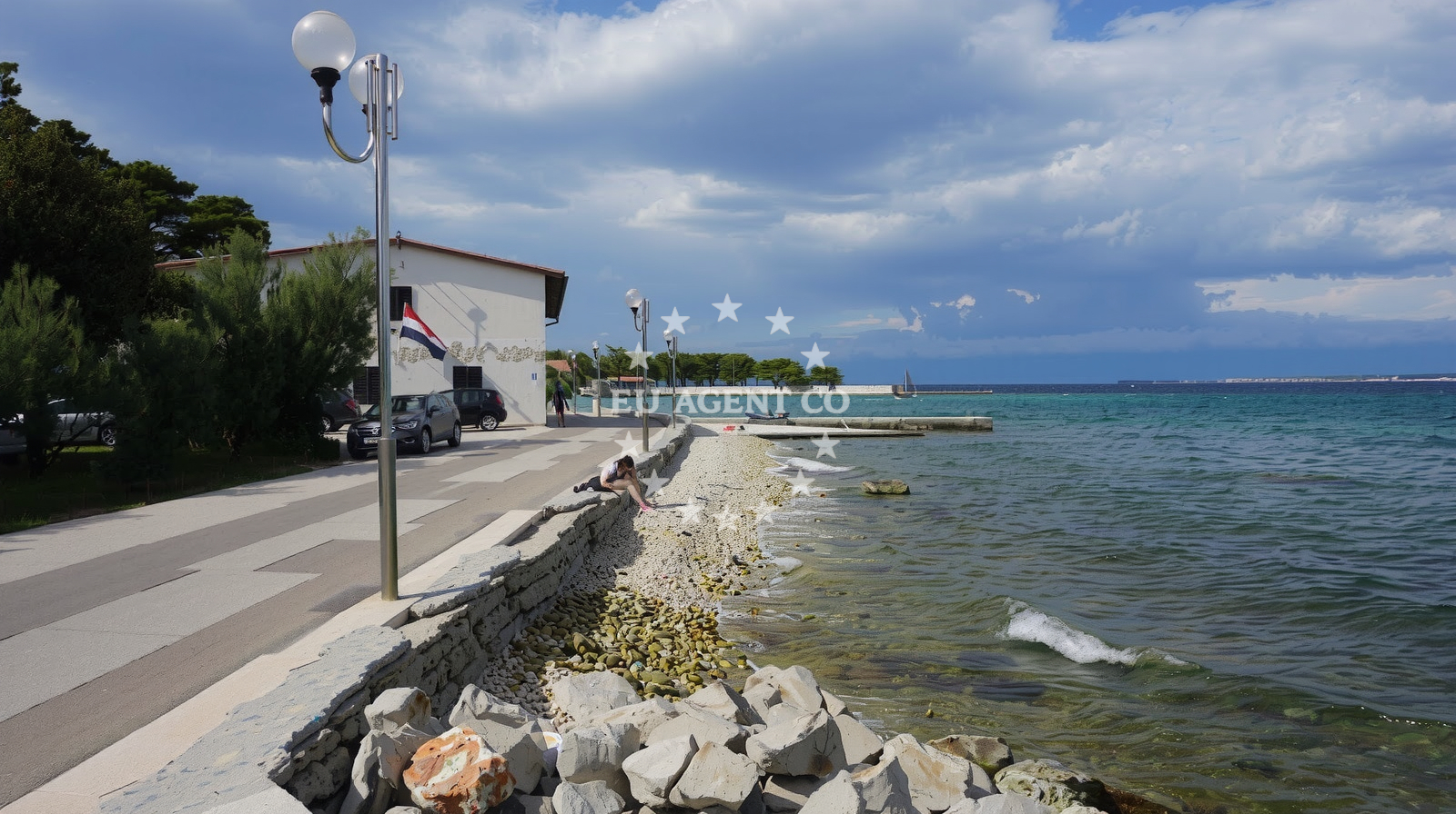 Shoreline and swimming area at Tratica beach in 38 Svetog Kuzme i Damjana, Ugljan