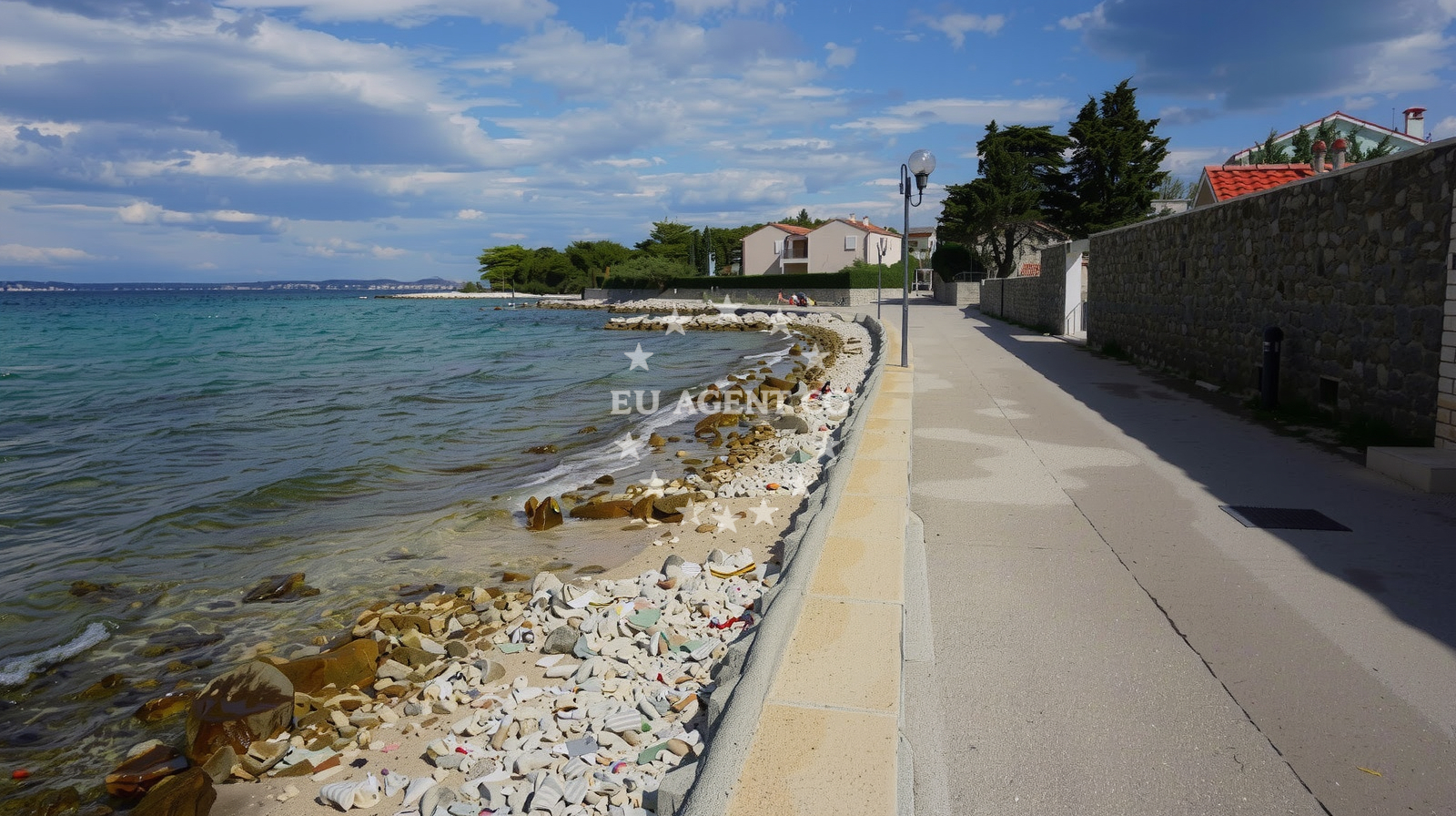 Sea and coastal view of Tratica beach in 38 Svetog Kuzme i Damjana, Ugljan