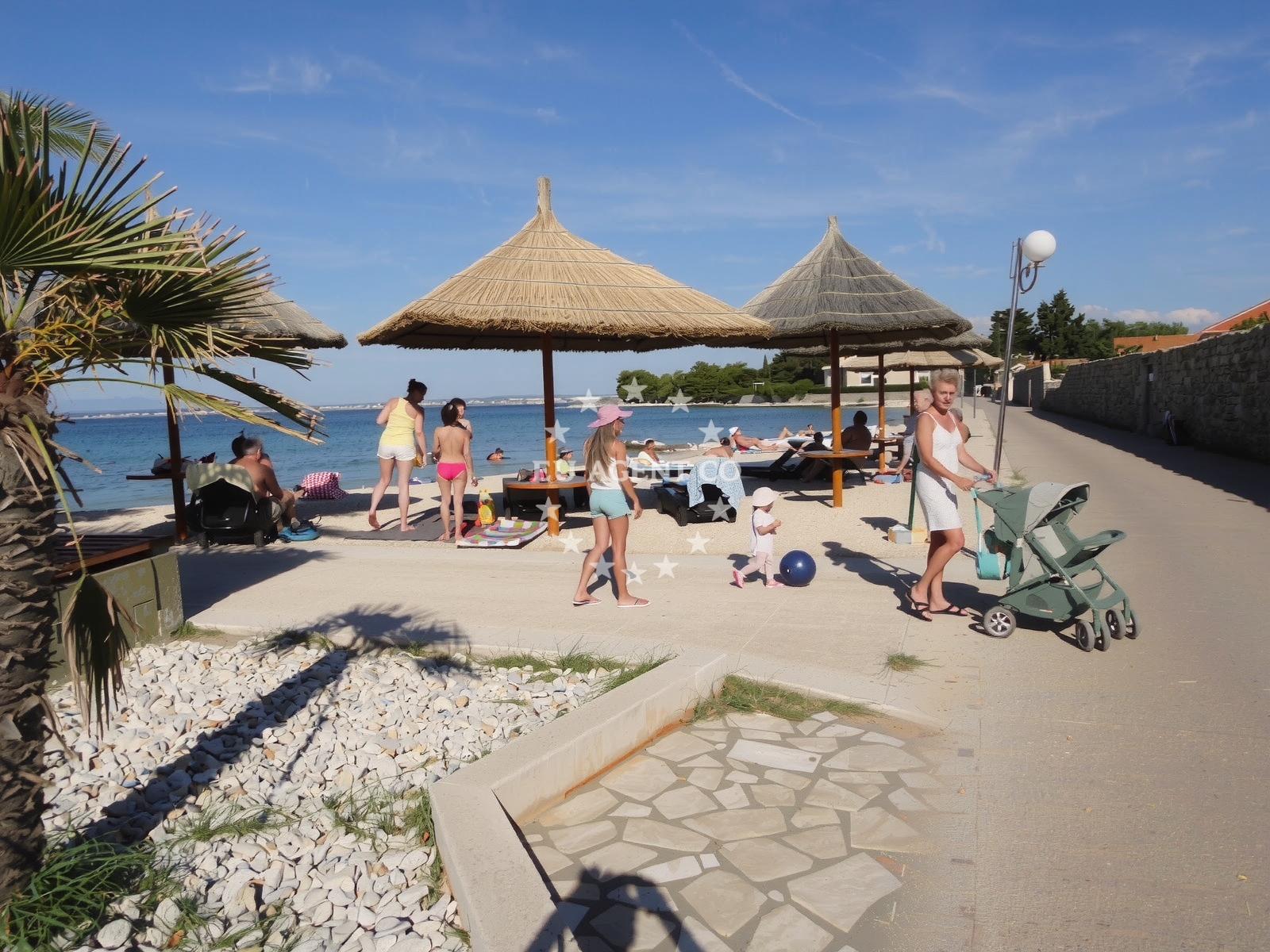 Beach facilities and surroundings at Tratica beach in 38 Svetog Kuzme i Damjana, Ugljan