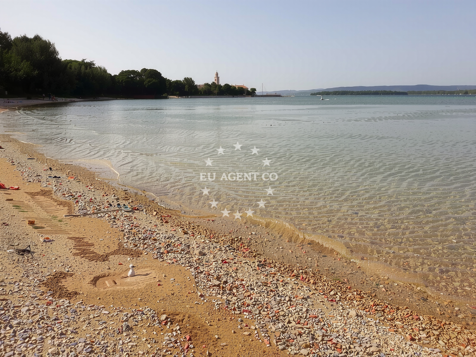 Shoreline and swimming area at Tratica beach in , Tkon