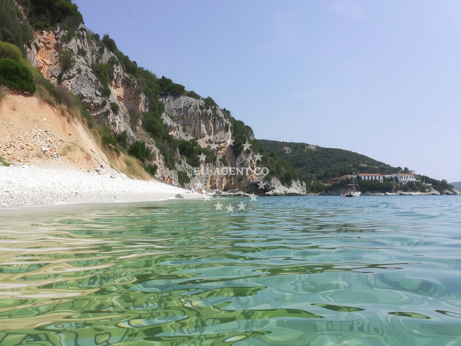 Shoreline and swimming area at Tri brata beach in 40 Štikovica, Zaton
