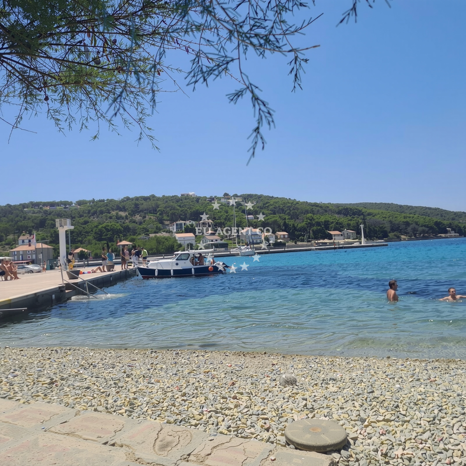 Shoreline and swimming area at Trutin Beach in Put Re?kova 3, Zlarin