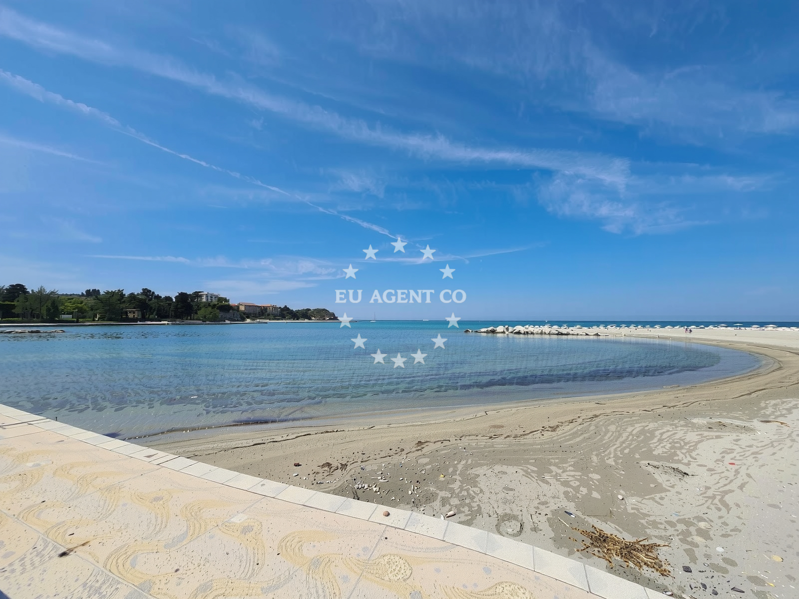 Shoreline and swimming area at Umag Sand Beach in 12 Gian Rinalda Carlia, Umag