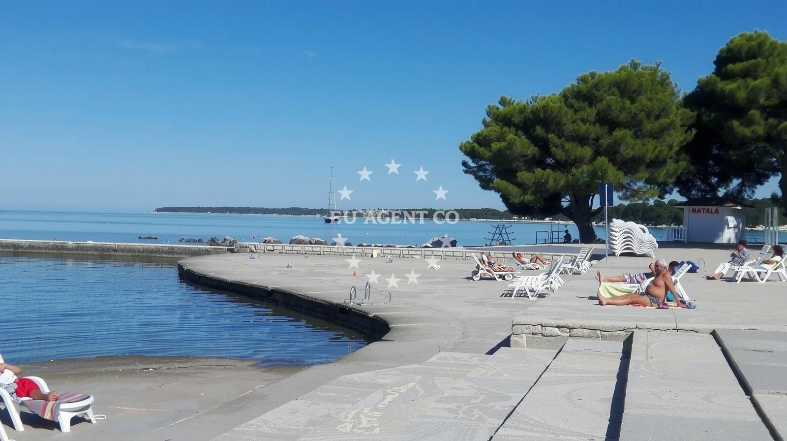 Beach facilities and surroundings at Umag Sandy beach in ISTARSKA 47, Umag