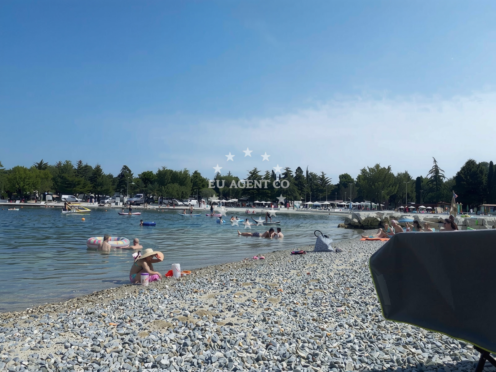 Shoreline and swimming area at Valkanela beach in Valkanela 6, Funtana