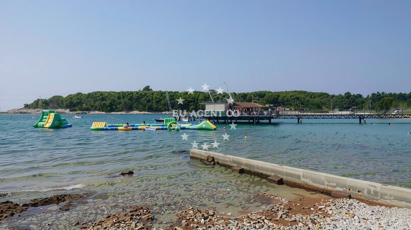 Shoreline and swimming area at Valovine beach in Stoja 37, Pula