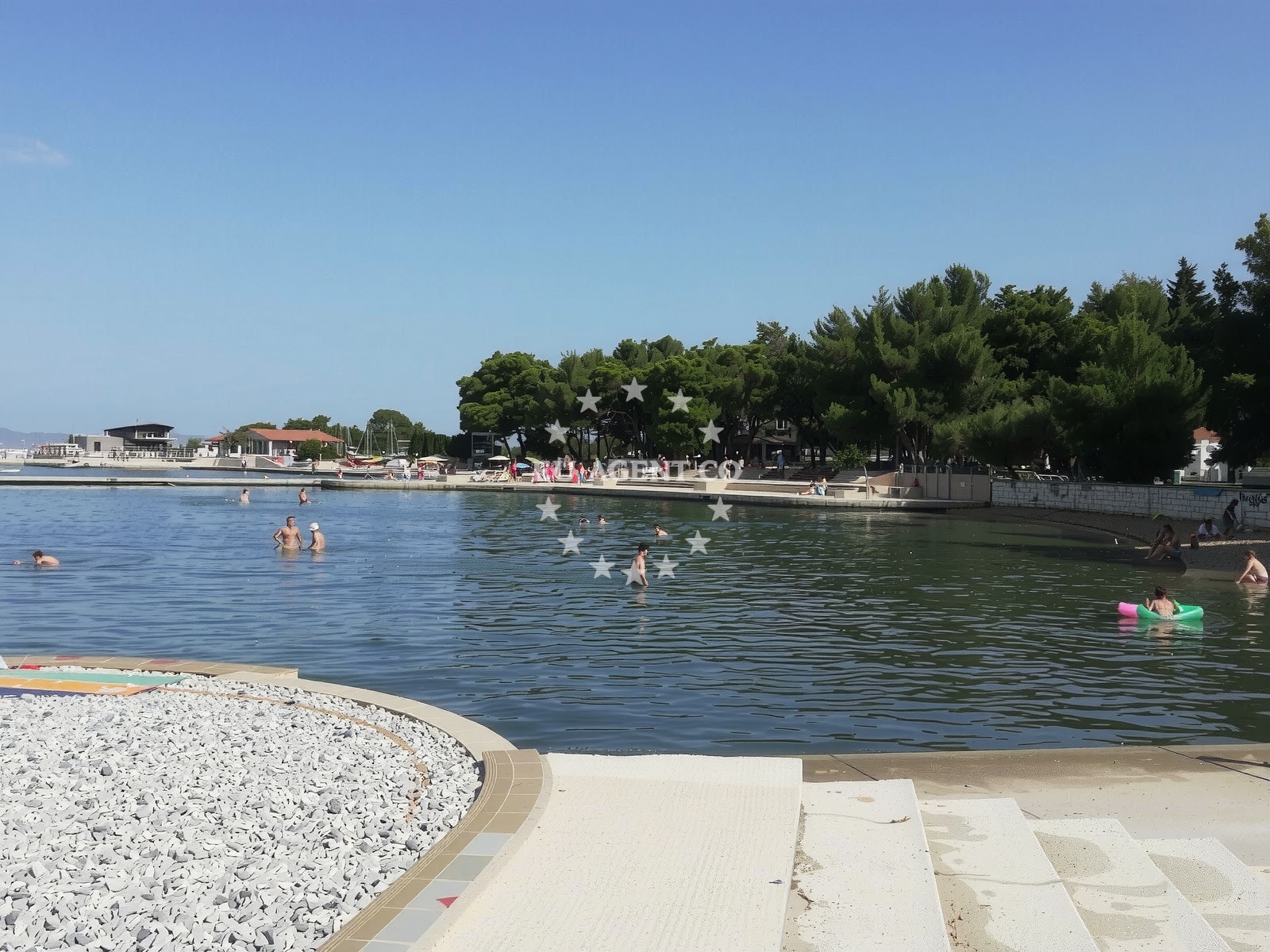 Shoreline and swimming area at Vela Draga beach