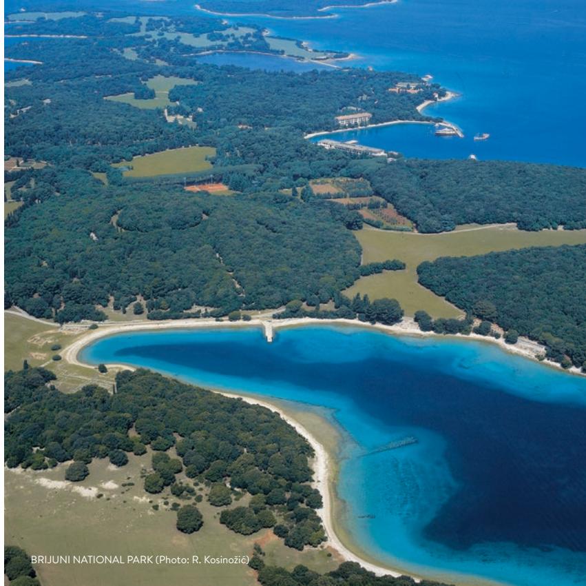 Brioni Sunny Camping beach with view of Brijuni National Park
