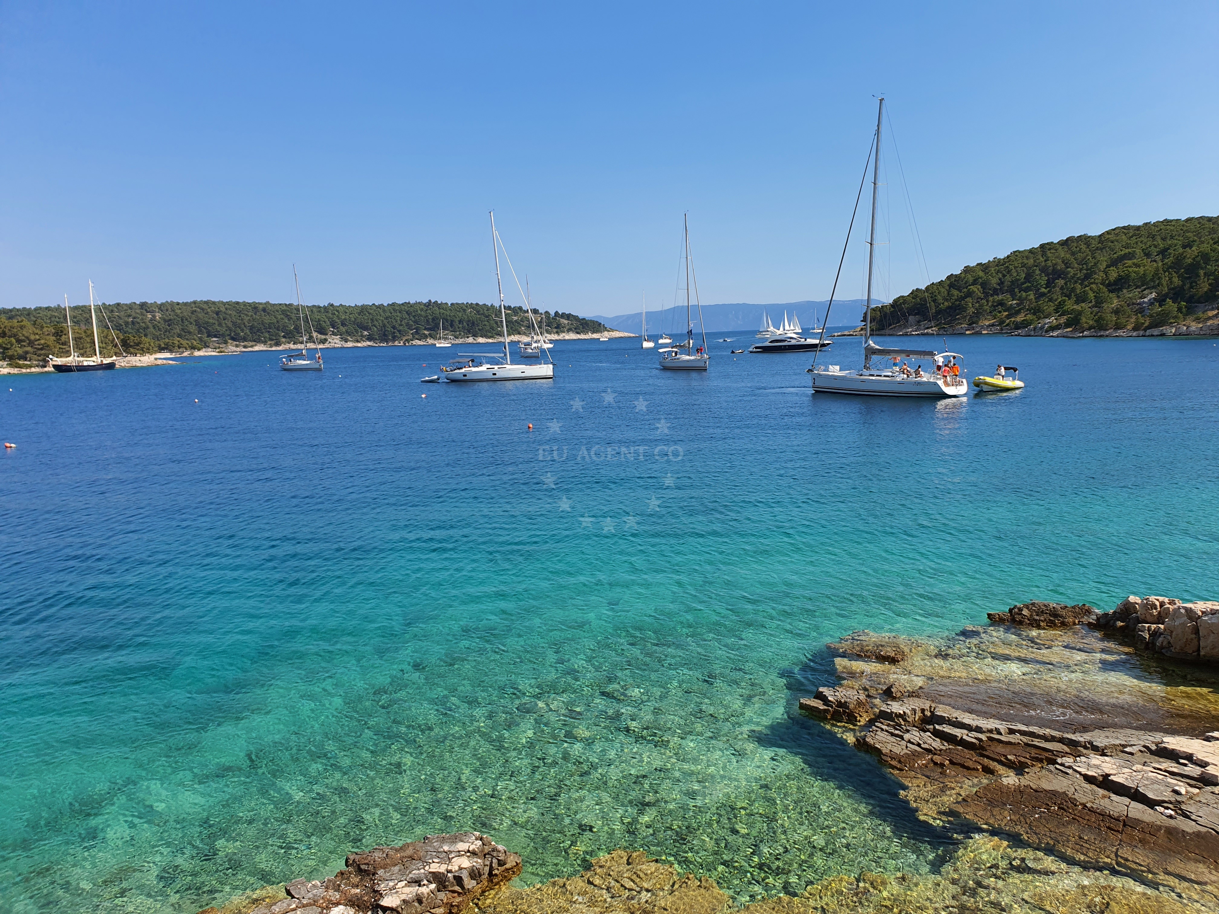 Sailboat moored at Konoba Familja buoys, Brac, Croatia