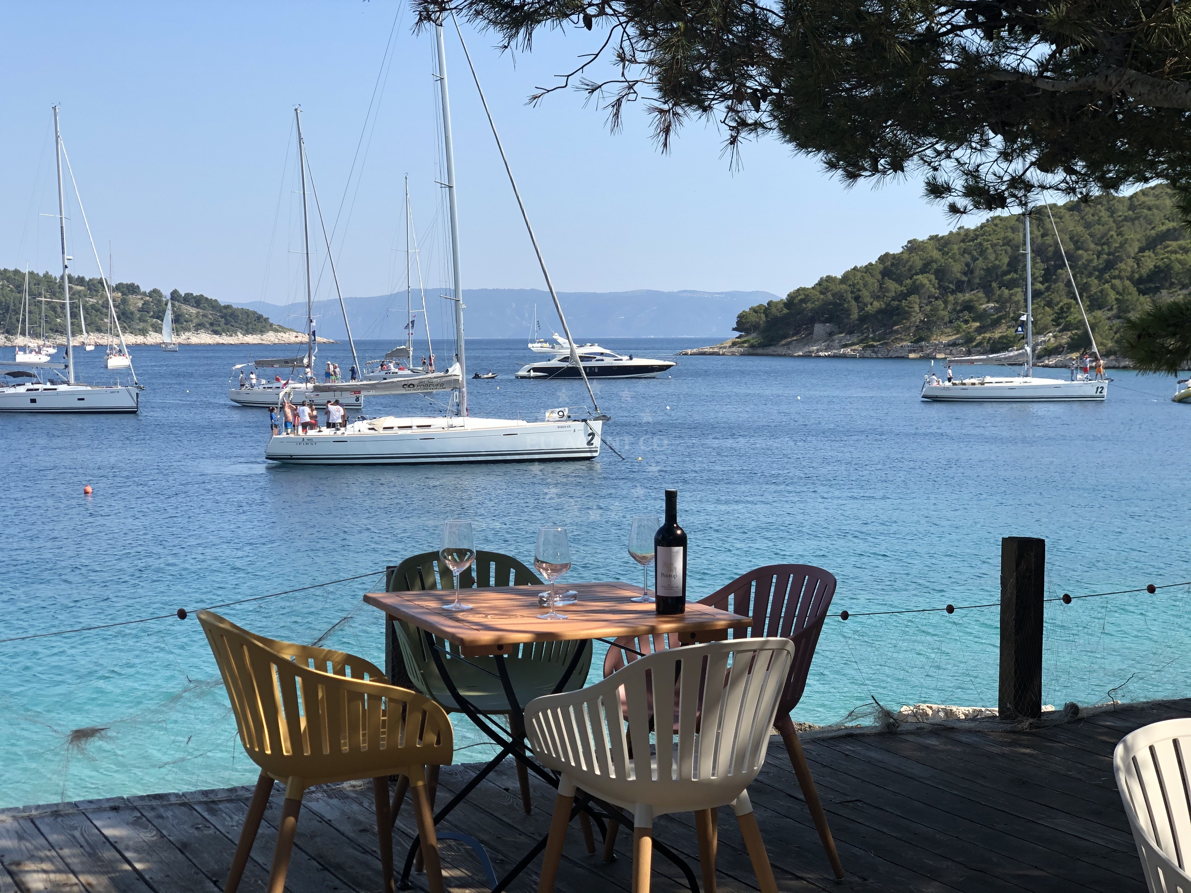 View of Konoba Familja restaurant from buoy field, Brac, Croatia
