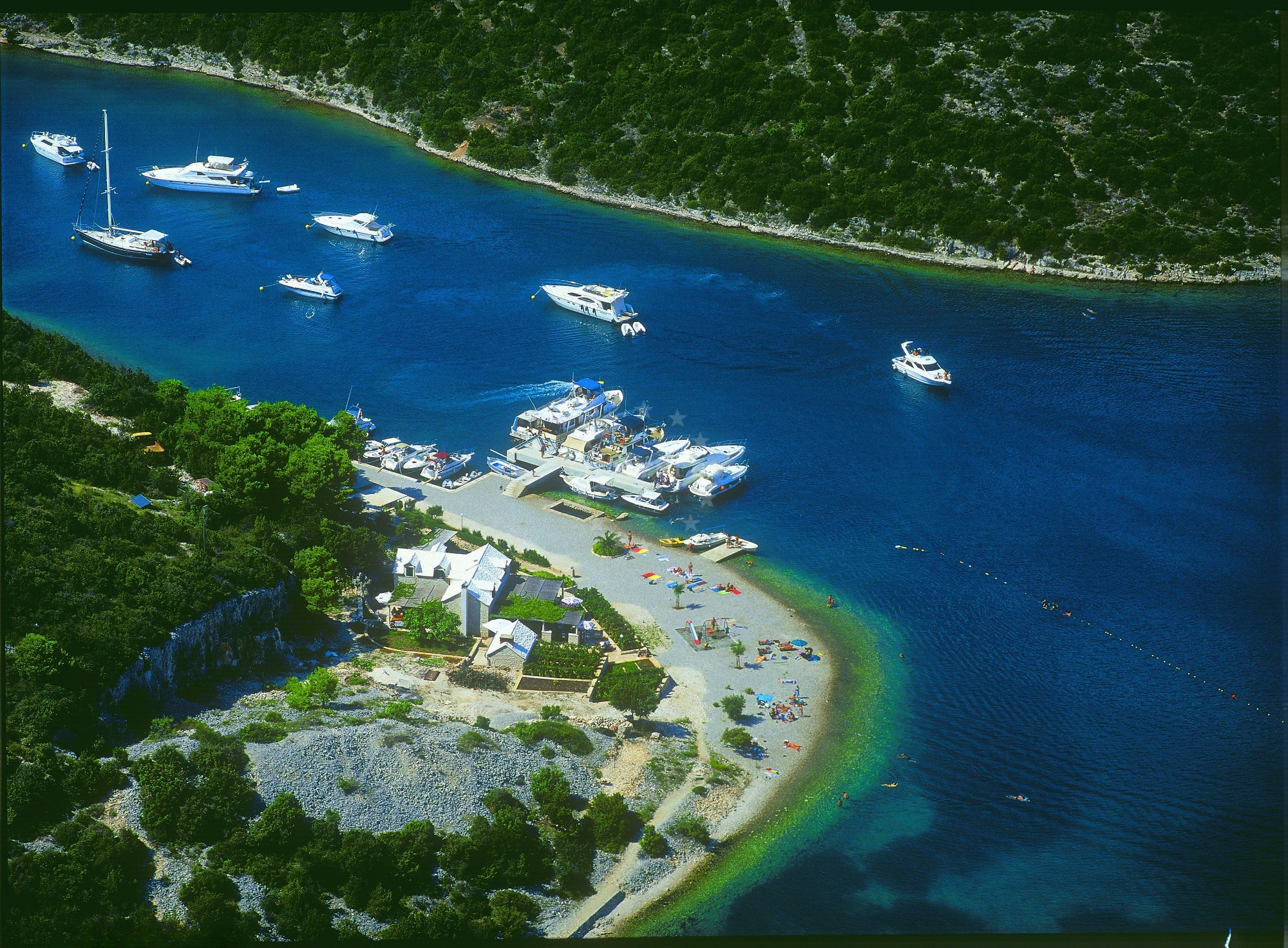 Concrete jetty and mooring buoys at Restaurant Pipo, Brač