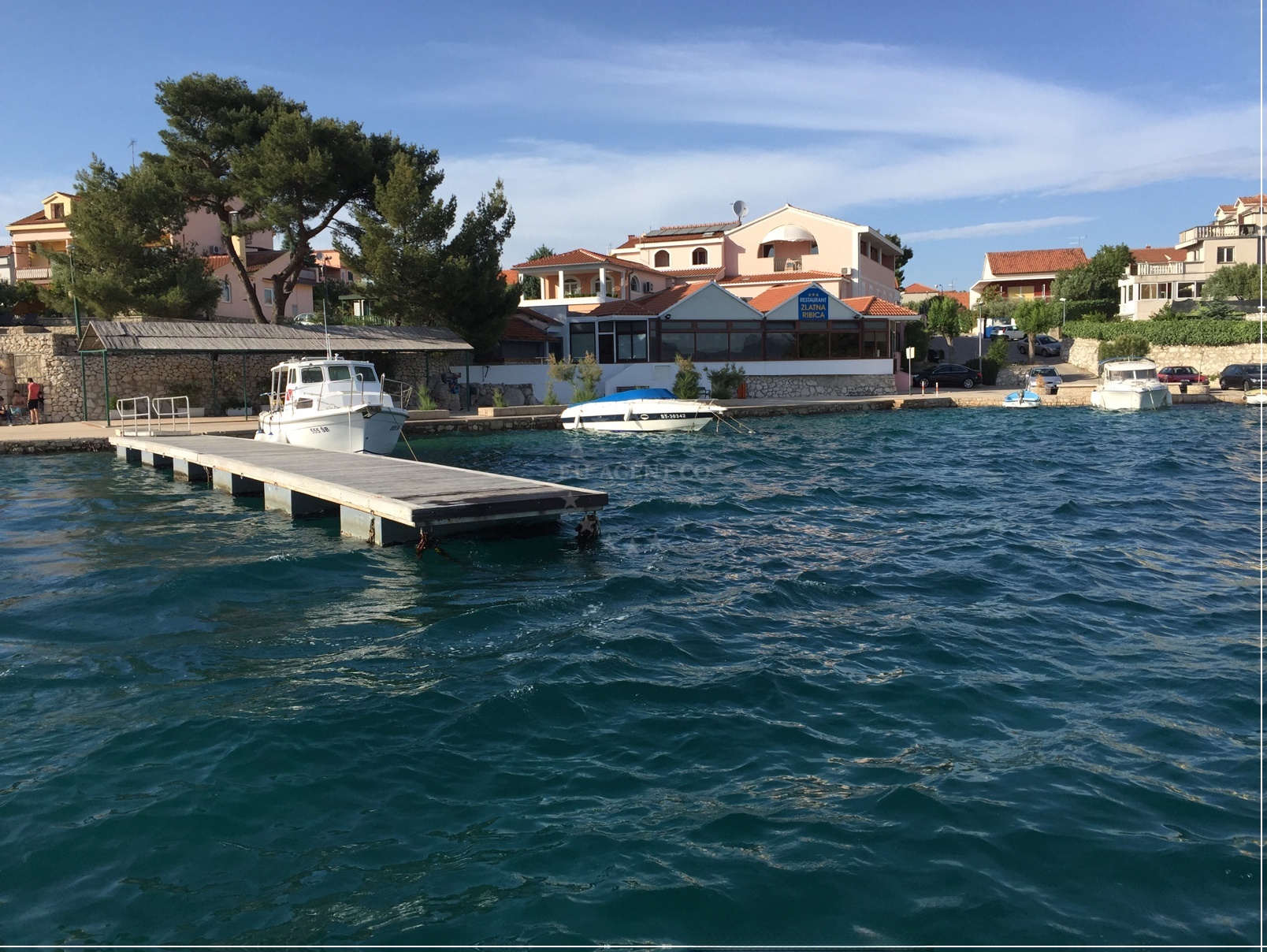 View of Zlatna Ribica restaurant from the jetty